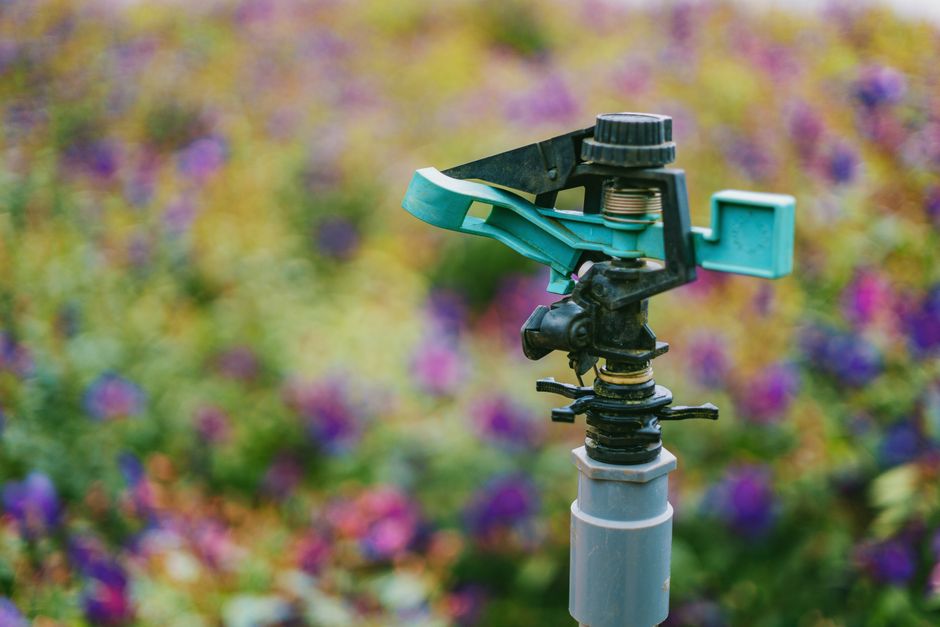 Advanced garden sprinkler system watering lush landscaping