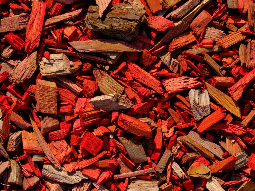 Beautiful landscape installation featuring fresh mulch and manicured garden